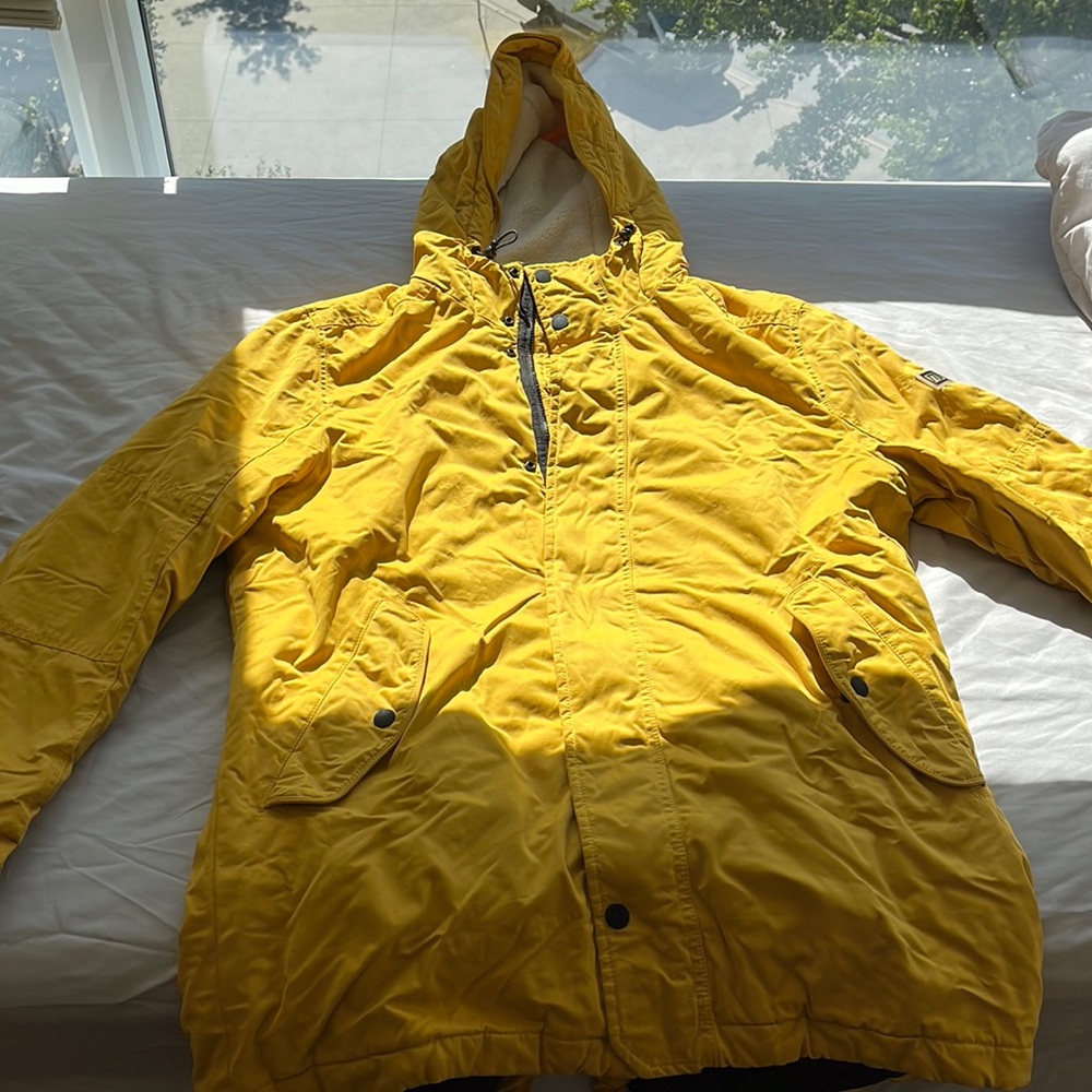 Big, thick, yellow coat